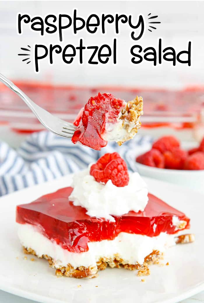 This Raspberry Pretzel Salad is a layered dessert with a base of crushed pretzels and two layers of cream cheese filling and raspberry jello.