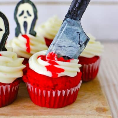 A close up of the knife in the Scream Cupcakes.