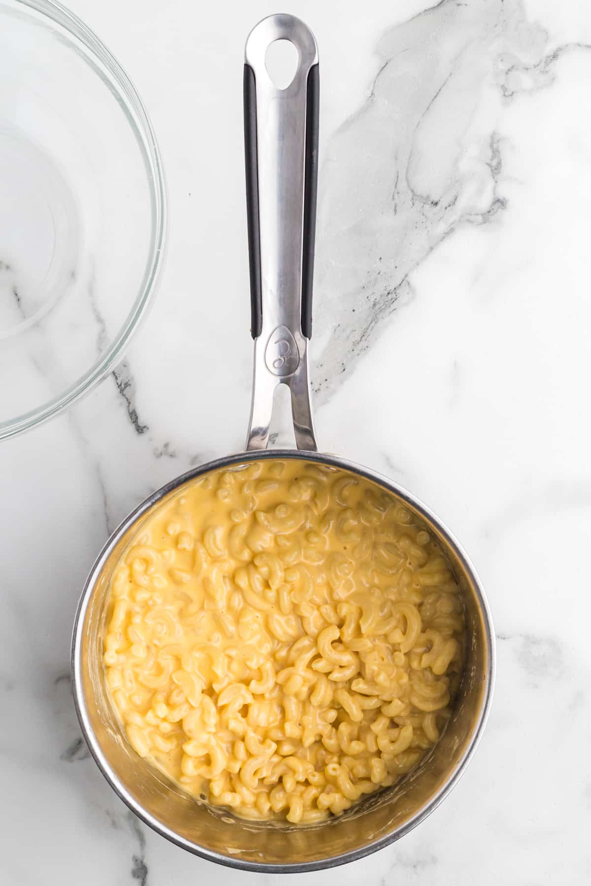 Overhead view of mac and cheese in a saucepan