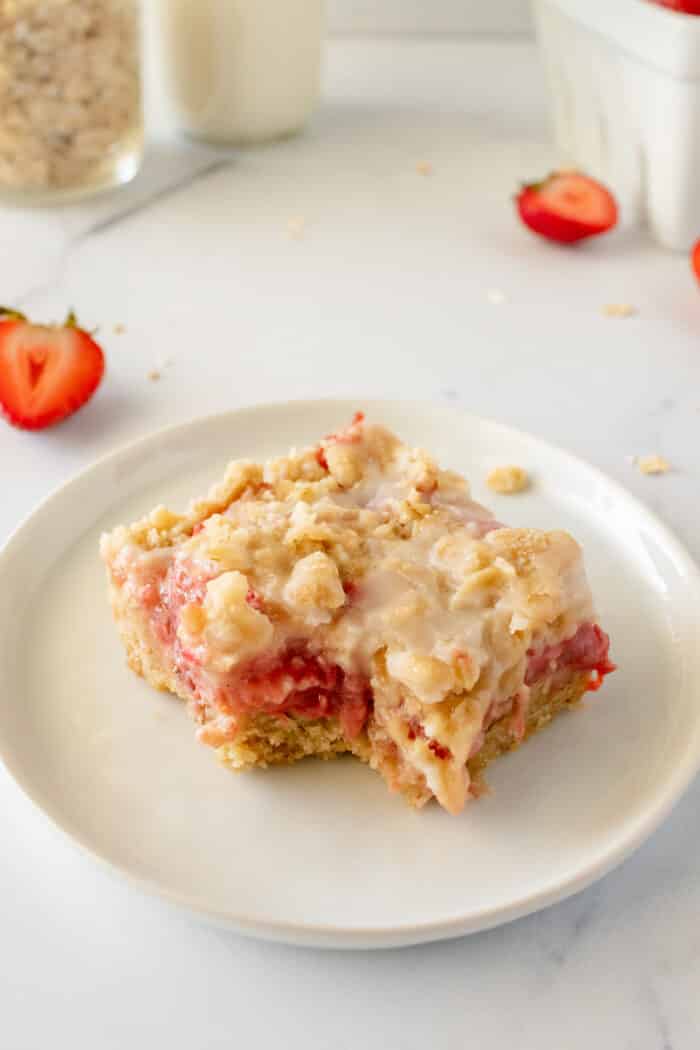 Strawberry Crumb Bars with a bite taken out.