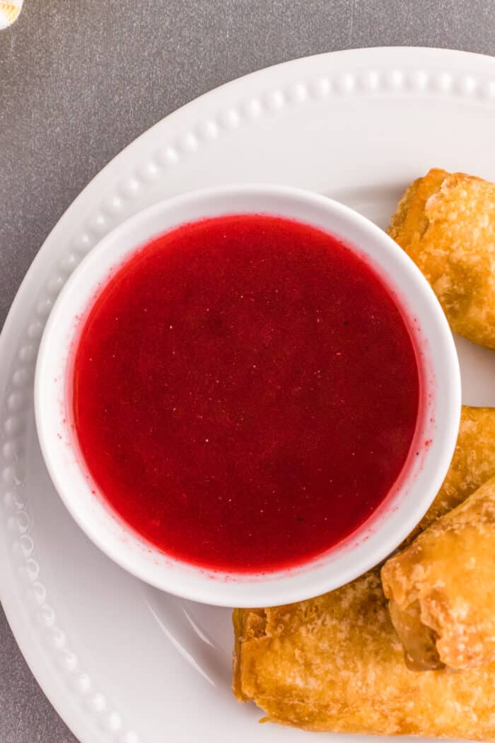 sweet and sour sauce in a white bowl