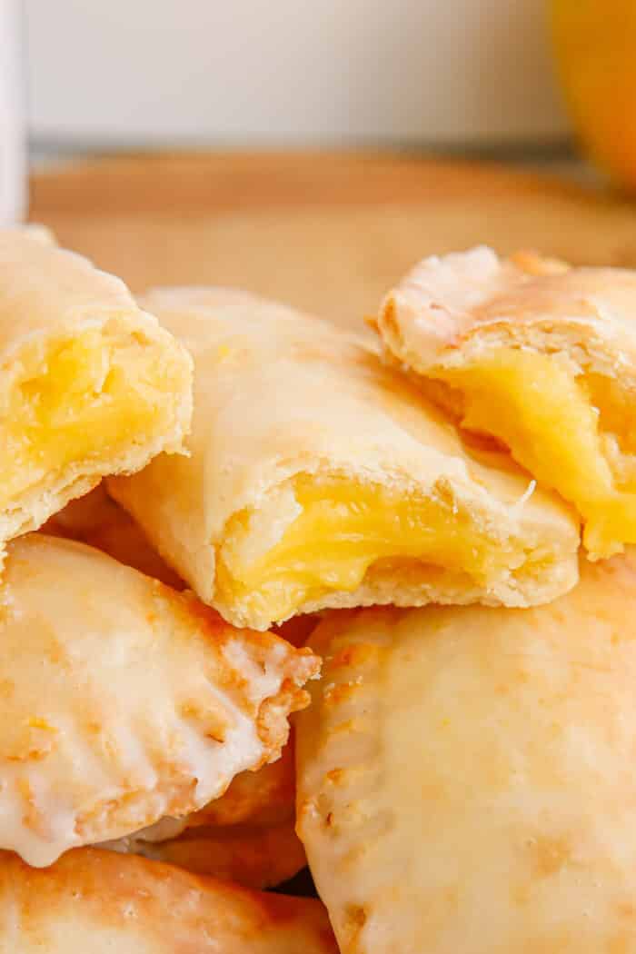 Air Fryer Lemon Hand Pies with a bite taken out.