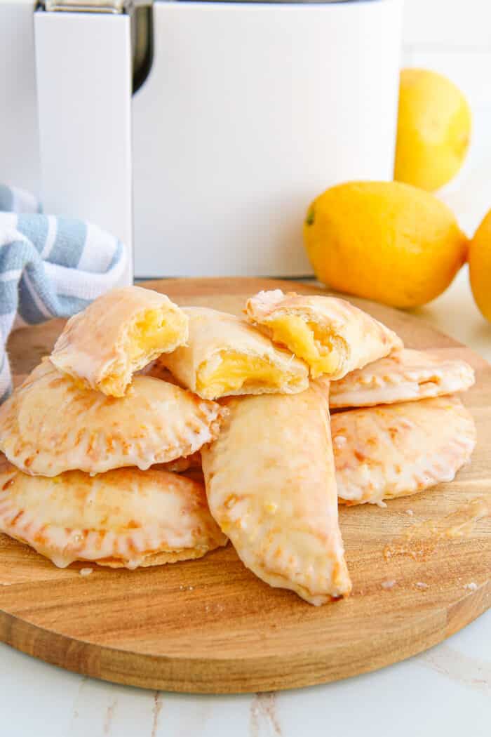 Air Fryer Lemon Hand Pies on a white table.