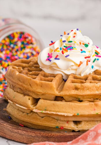 Waffles with whipped cream and sprinkles