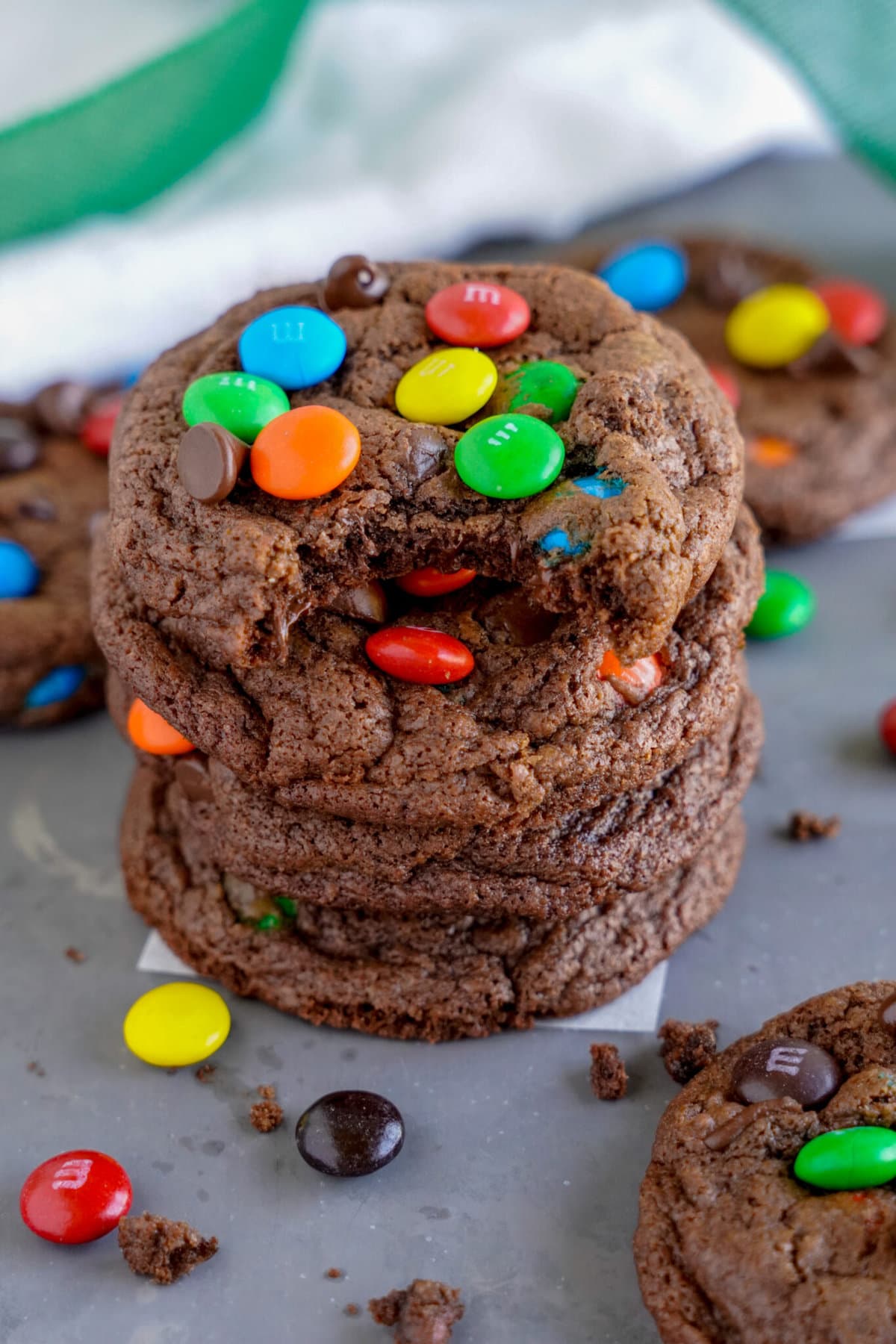 Chocolate M&M Cookies with a bite take out.
