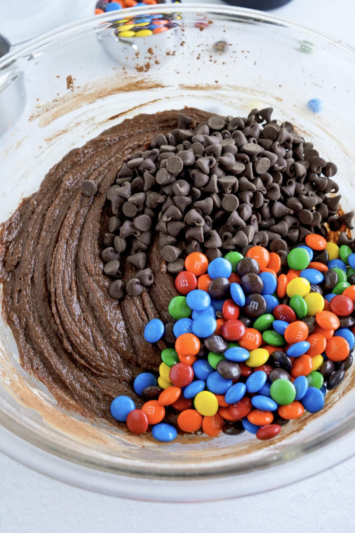 Adding the chocolate chips and M&M's.