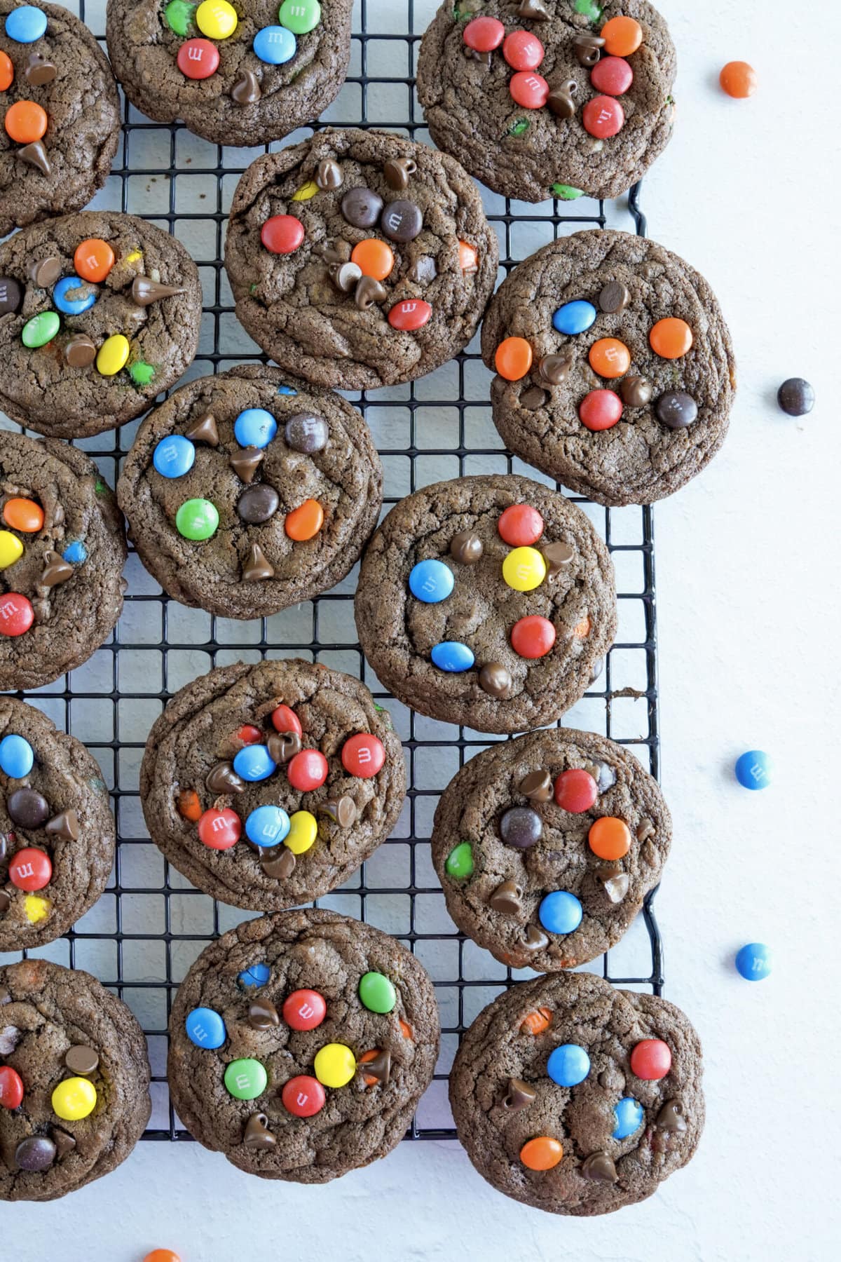 Chocolate M&M Cookies on a cooling rack.