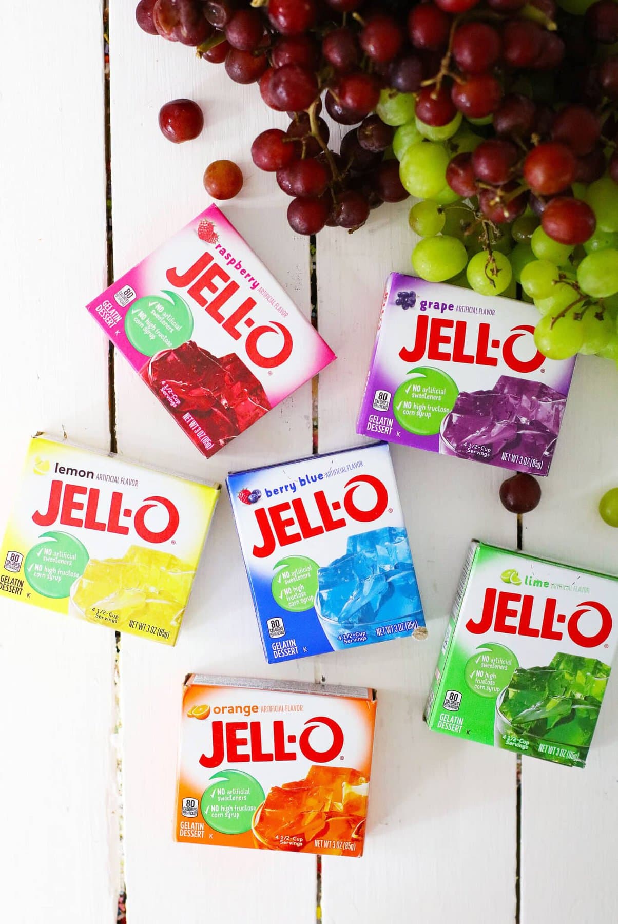 The boxes of jello on a table.