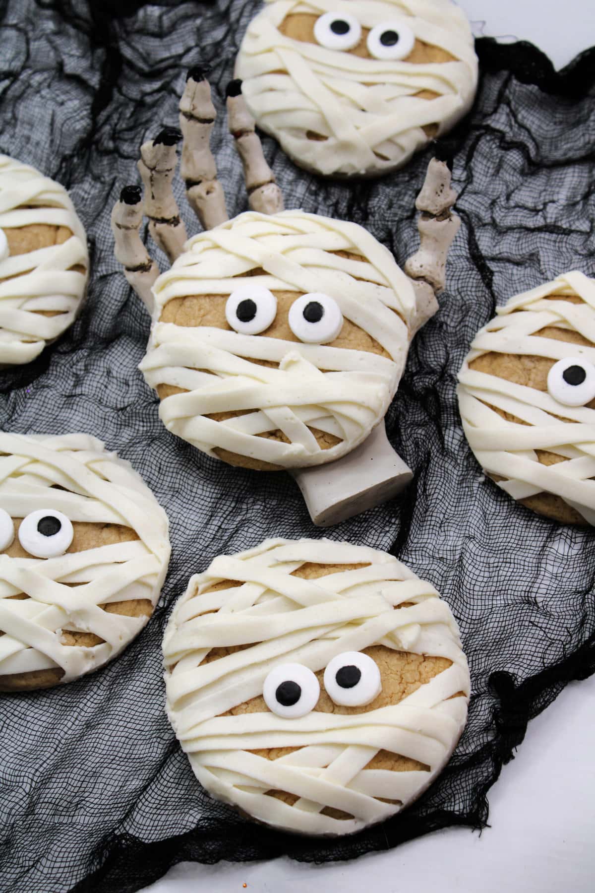 Mummy Cookies on a cloth.