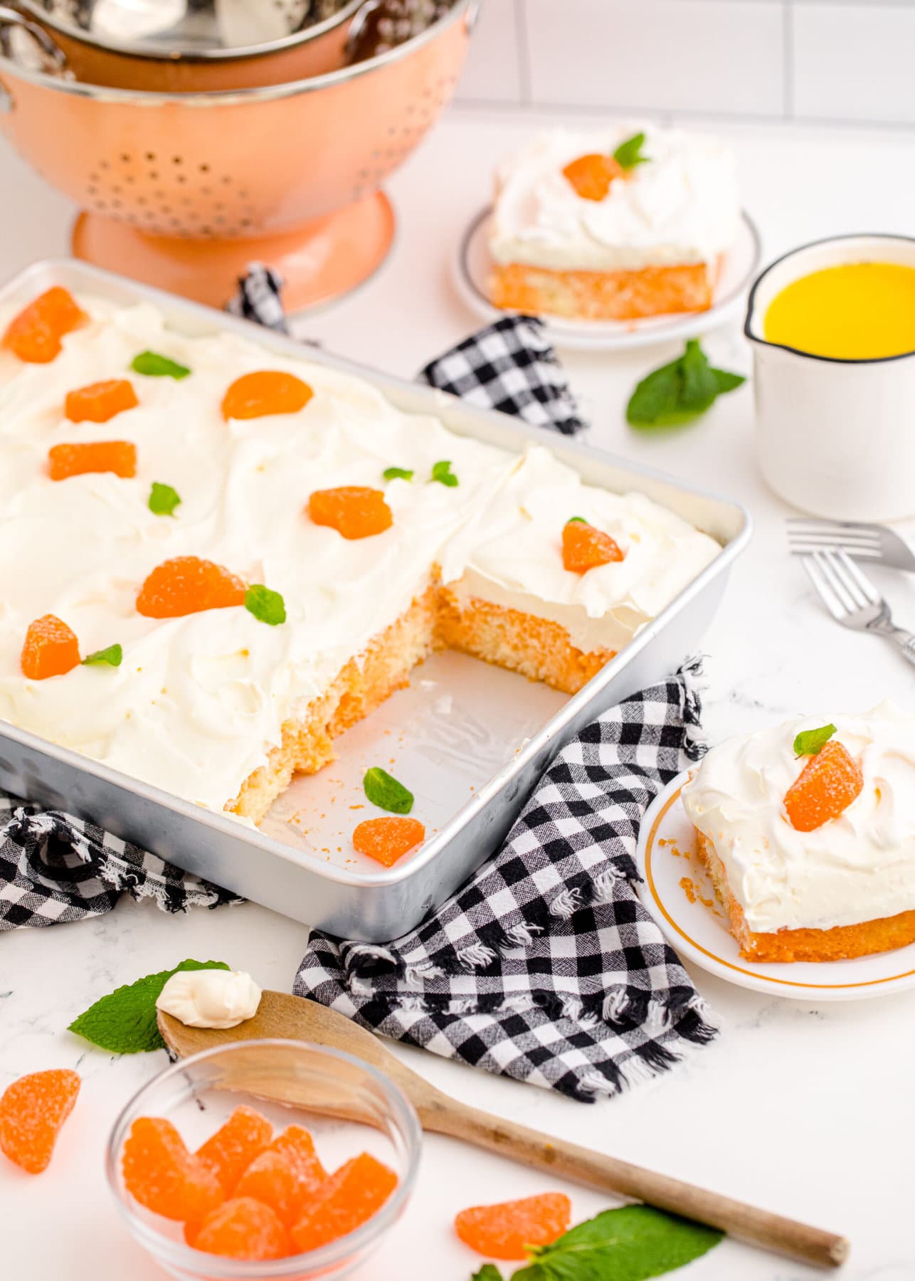 Creamsicle Orange Poke Cake in a baking pan