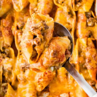 Overhead view of taco stuffed shells on a spoon