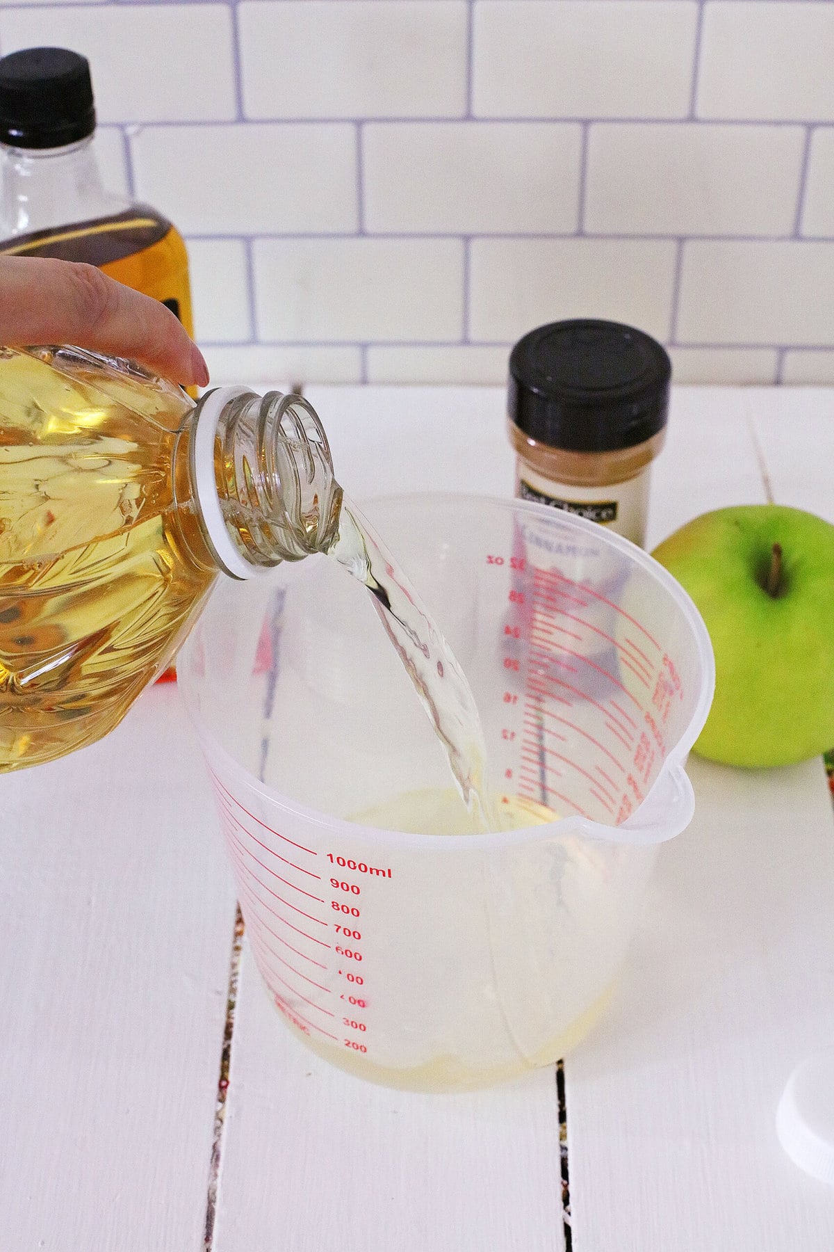 Adding the apple cider.
