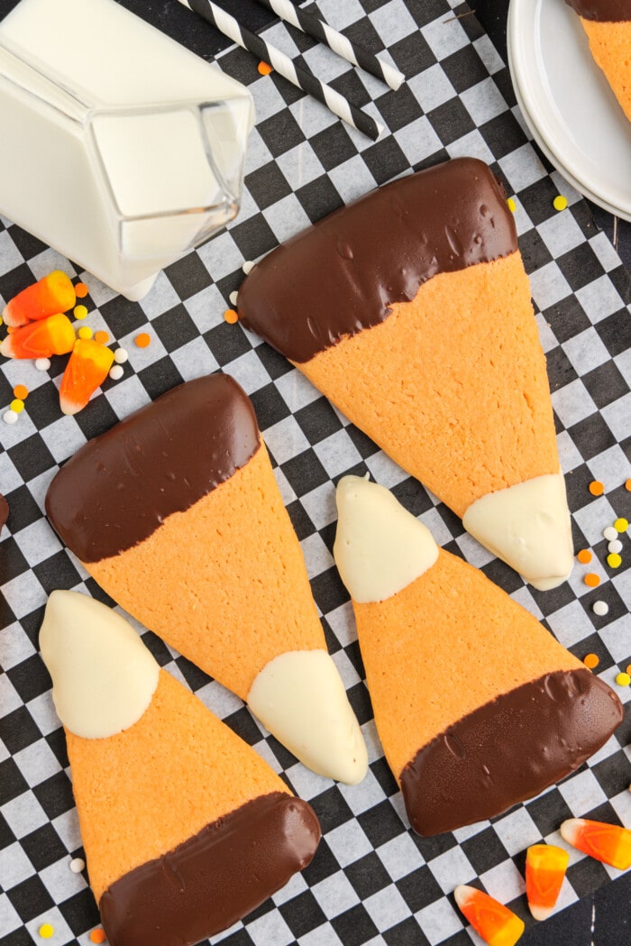 Candy Corn Sugar Cookies on a checkered table cloth.