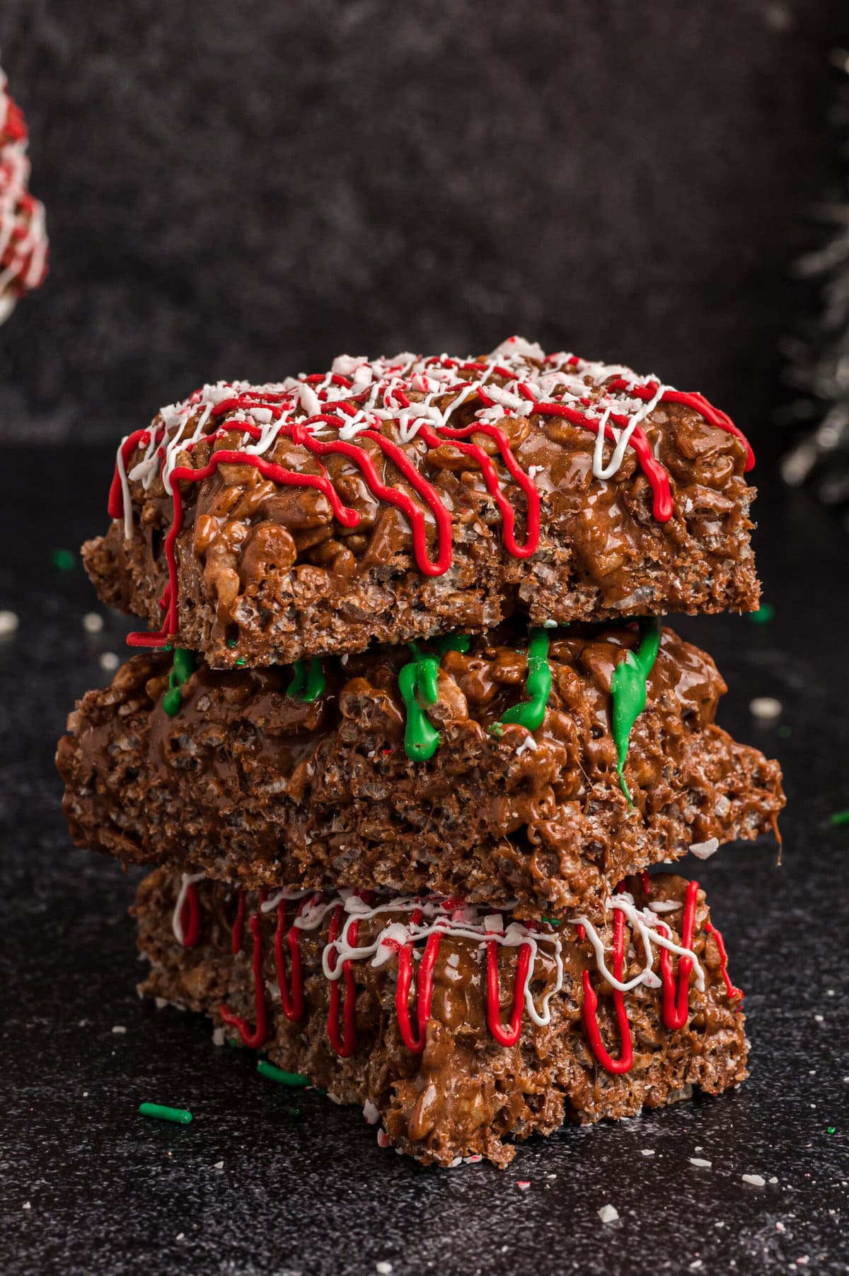 Chocolate Peppermint Rice Krispie Treats stacked on top of each other.