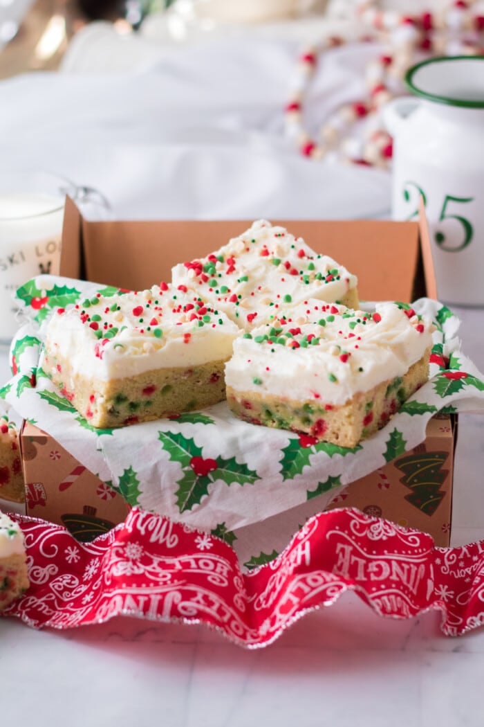 Christmas Sugar Cookie Bars with festive tissue paper.