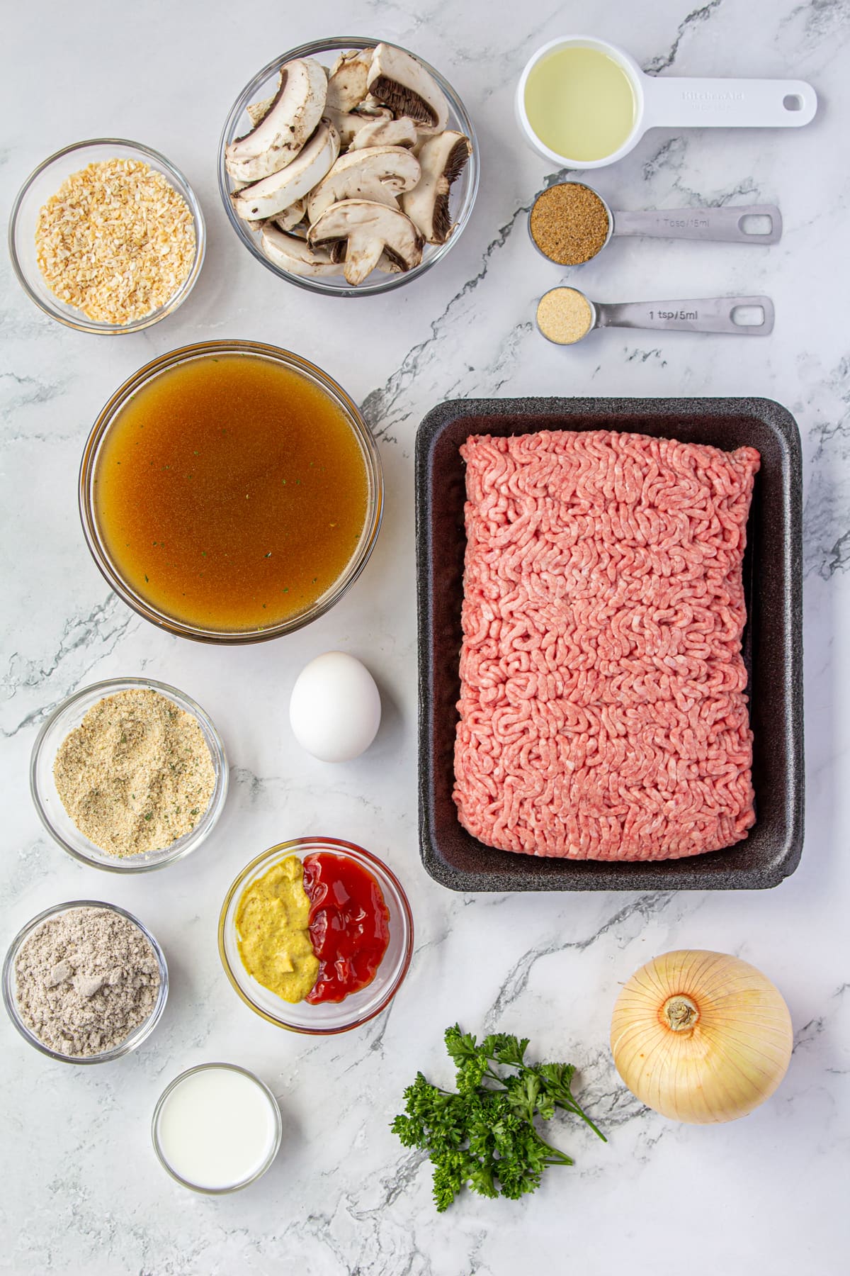 All the ingredients for Hamburger Steak and mushroom gravy laid out on the counter.