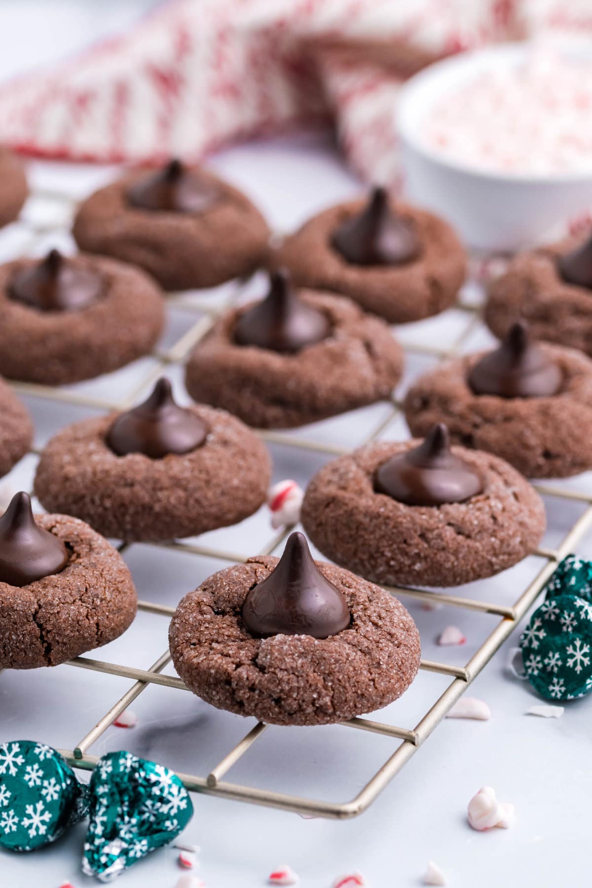Mint Kiss Cookies on a cooling rack.