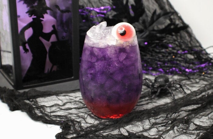 Purple Hooter Cocktail in a clear glass.