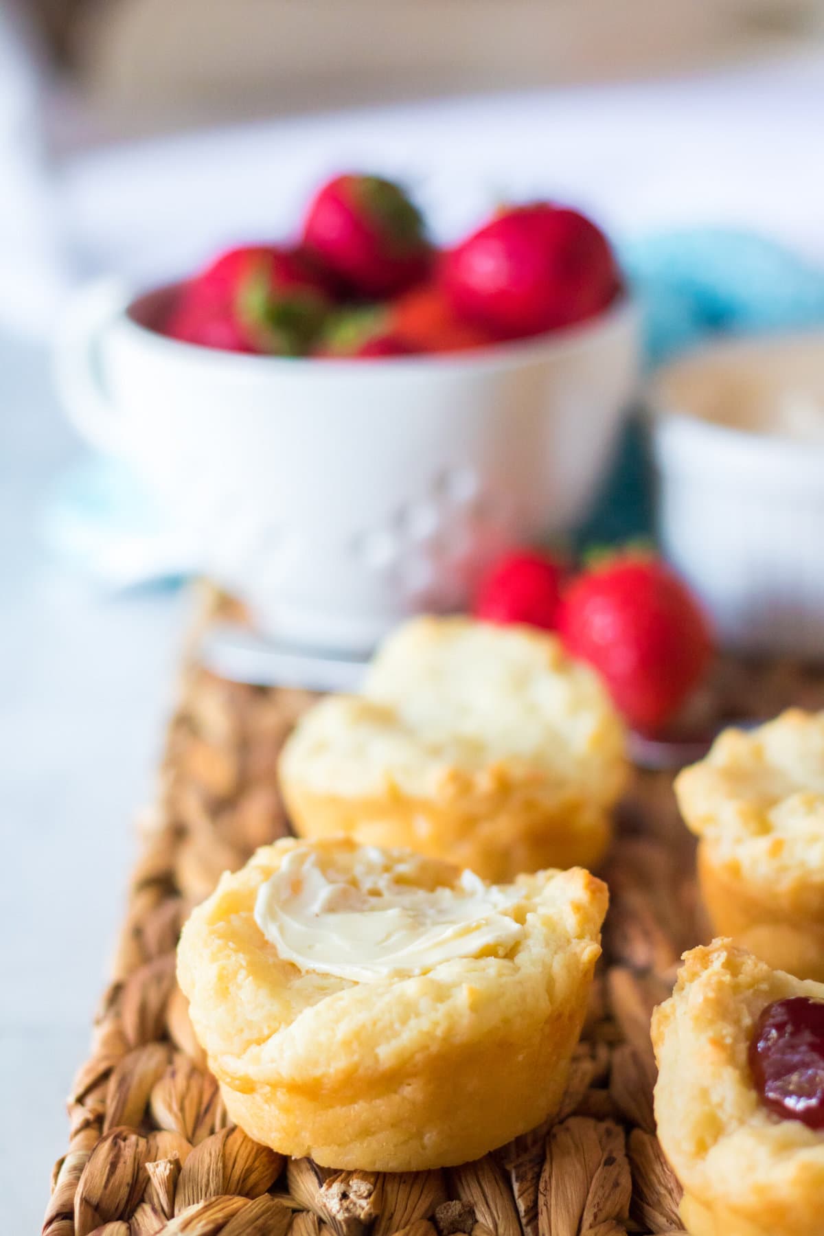 Sour Cream Biscuits with butter on top.