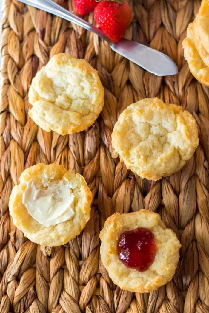 Spreading butter on the Sour Cream Biscuits.