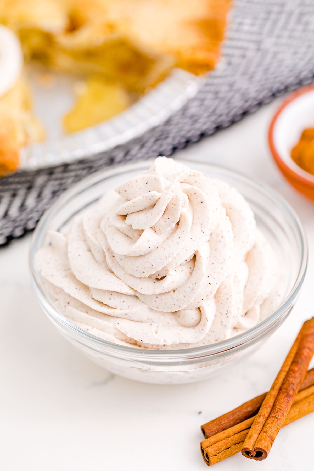 Cinnamon Whipped Cream in a glass bowl