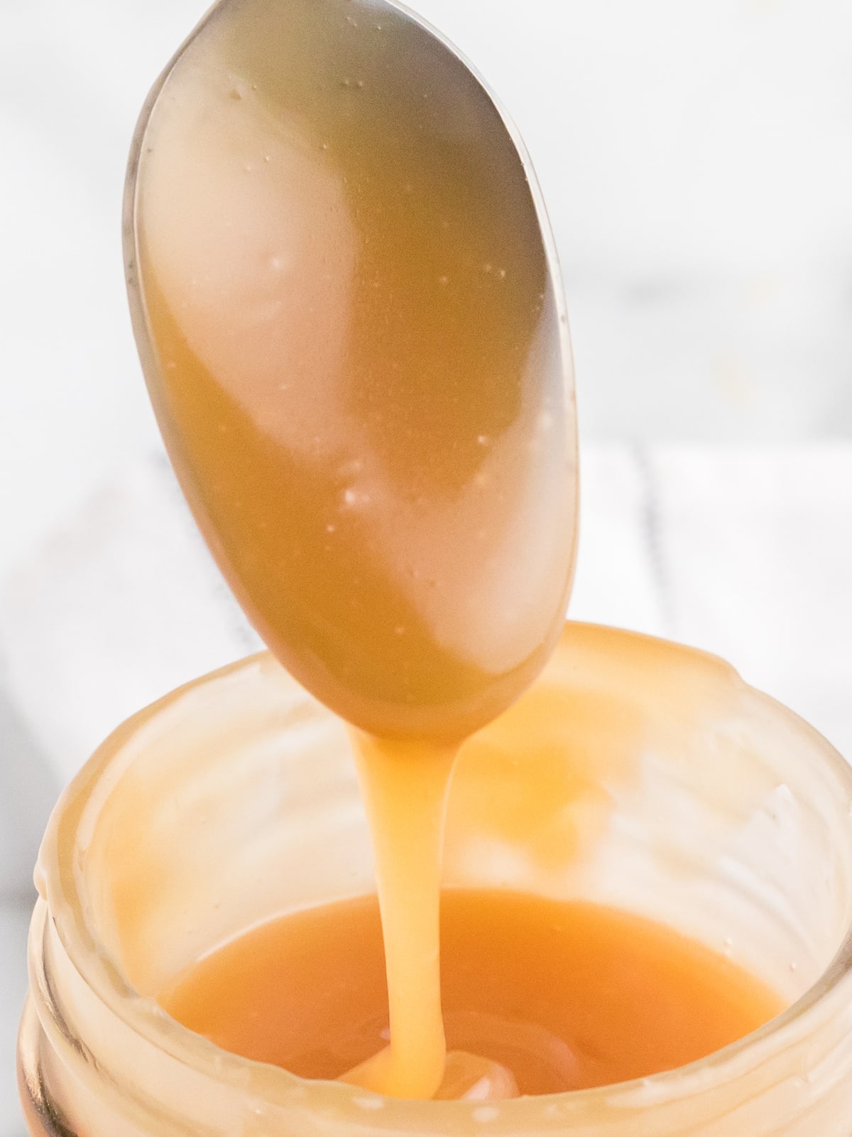 Caramel Sauce on a spoon