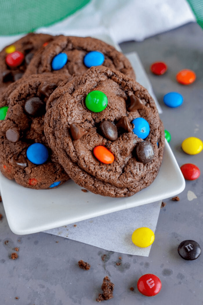 Chocolate M&M Cookies on a white platter