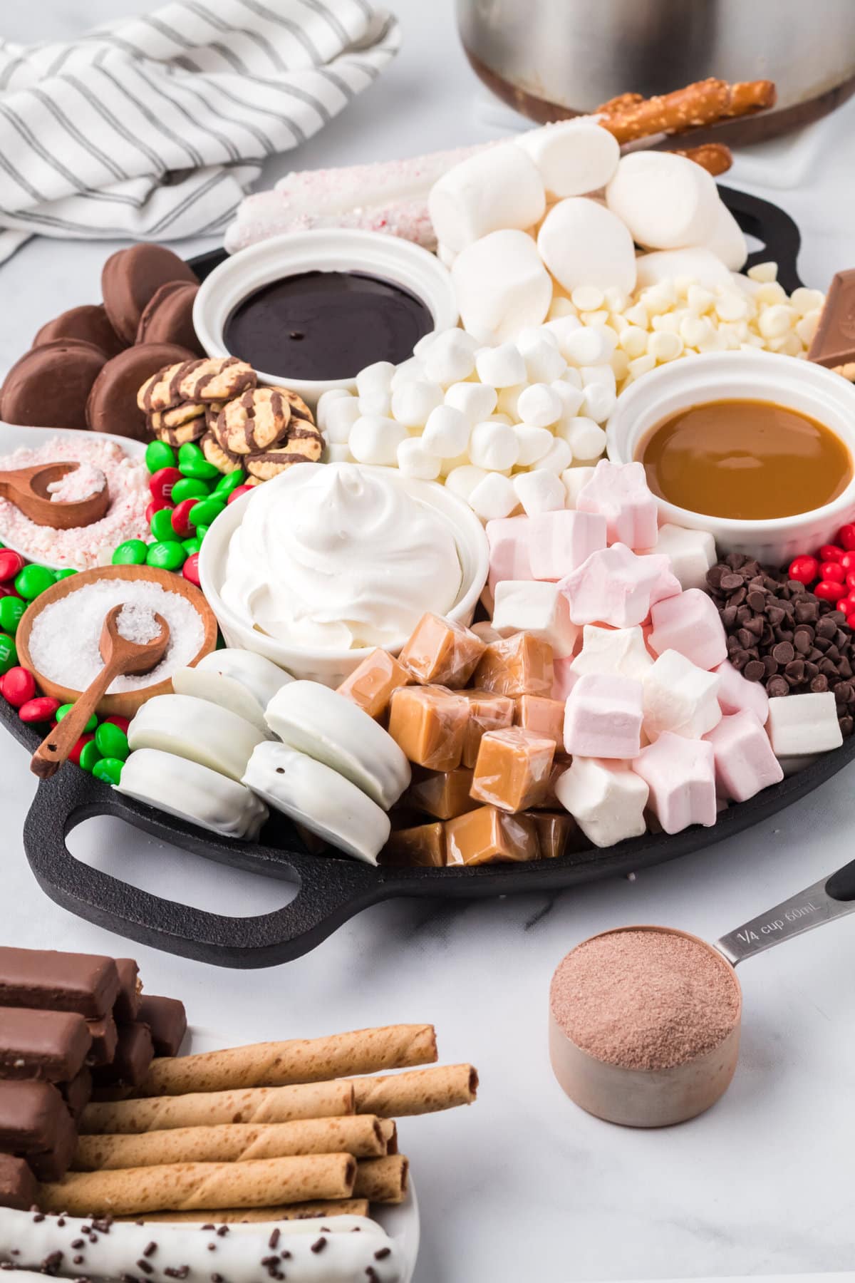 Hot Chocolate Board with whipped cream, marshmallows, cookies, and more. 