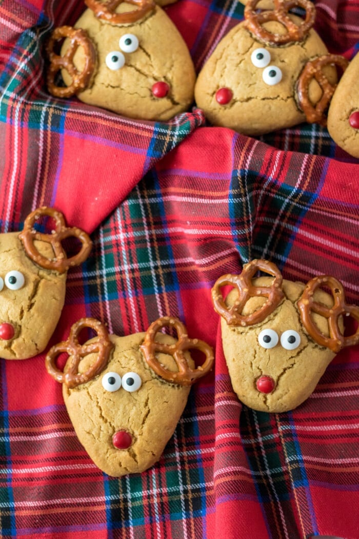 Peanut Butter Reindeer Cookies on a table cloth.