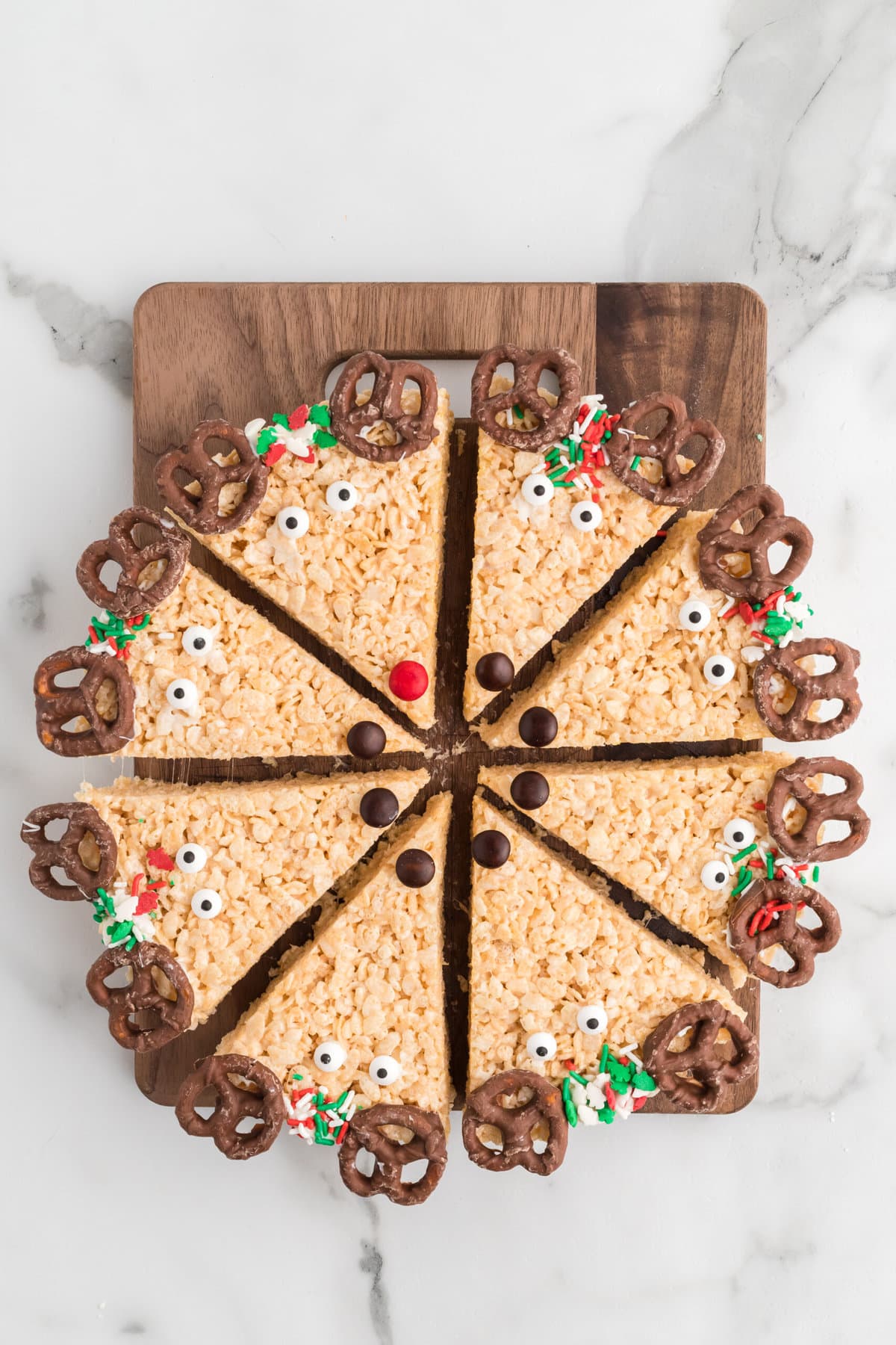 Reindeer Rice Krispie Treats on a wooden board.