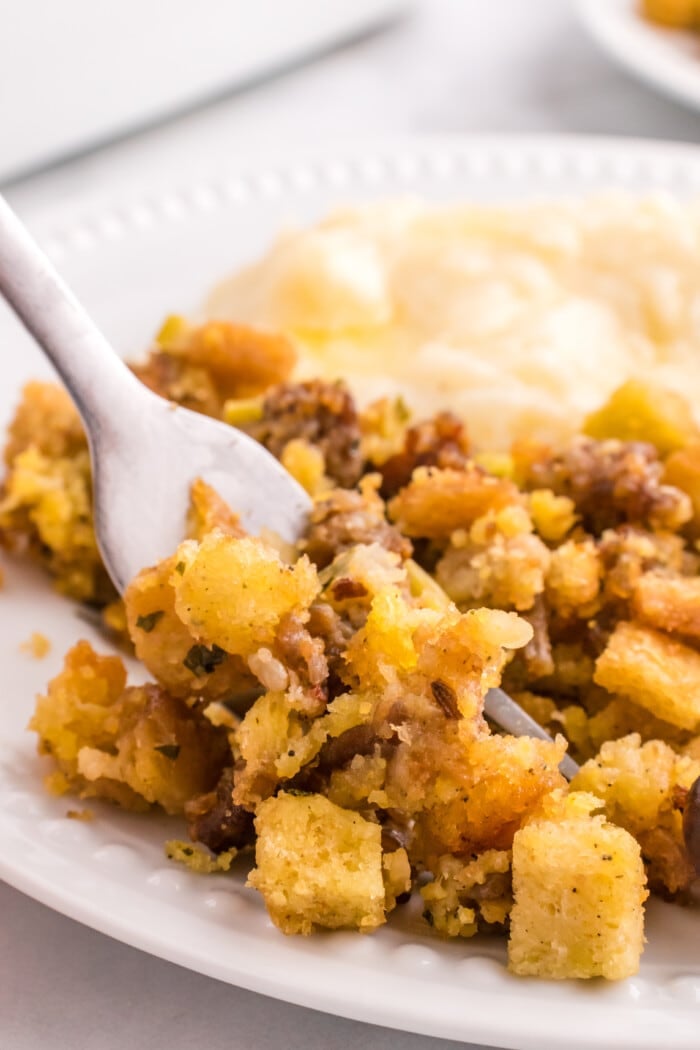 Sausage Stuffing Recipe on a white plate.