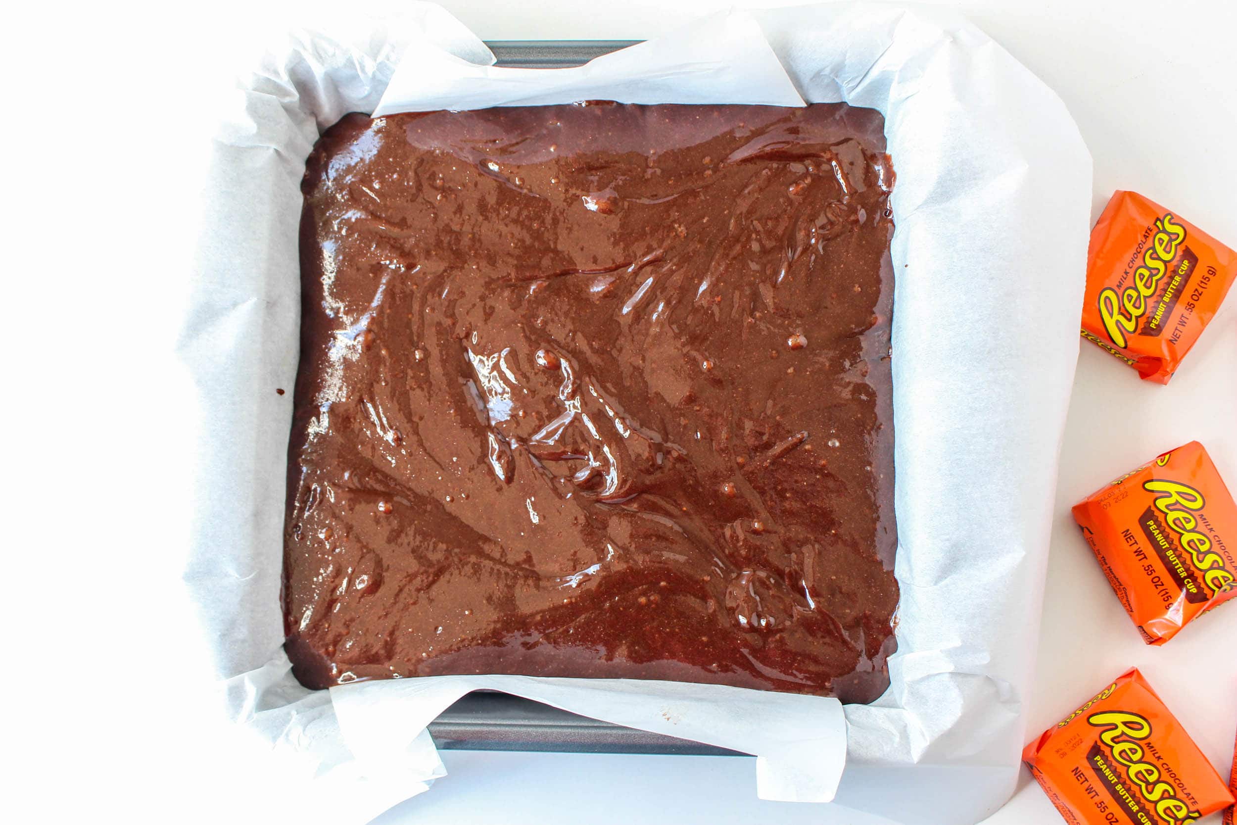The brownie mix in the pan.
