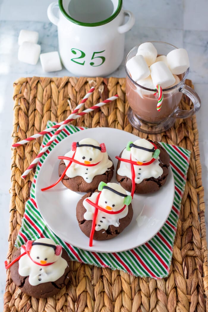 Snowman Cookies on a white plate.