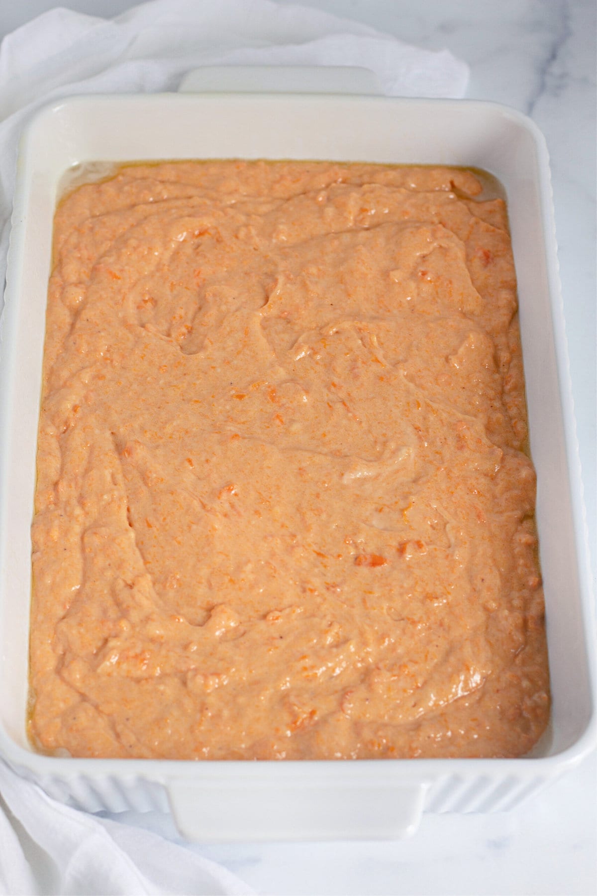 sweet potato cake batter in a pan