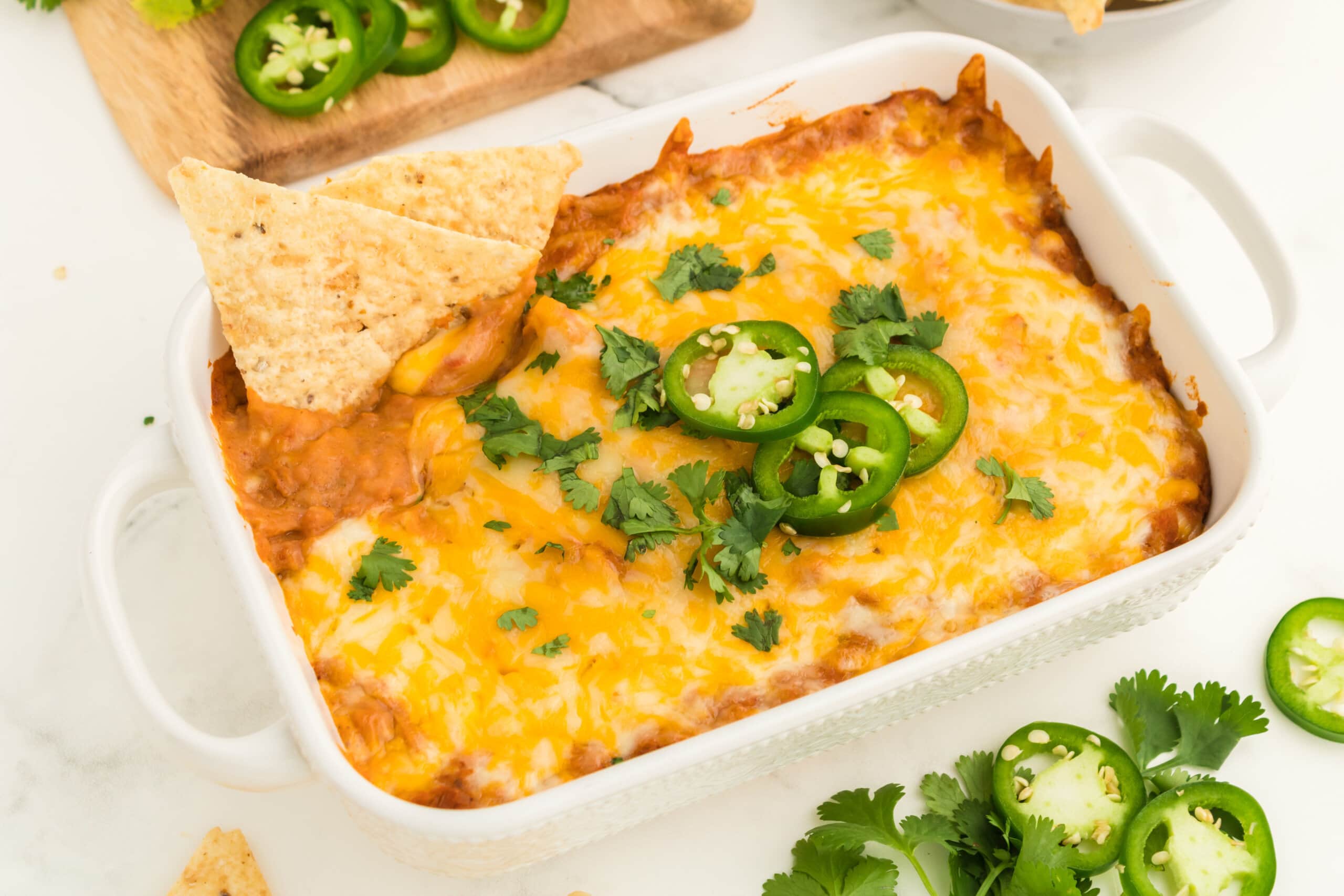 Bean Dip topped with cilantro and jalapenos.
