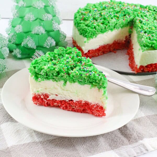 Christmas Rice Krispie Cheesecake with holiday decorations.