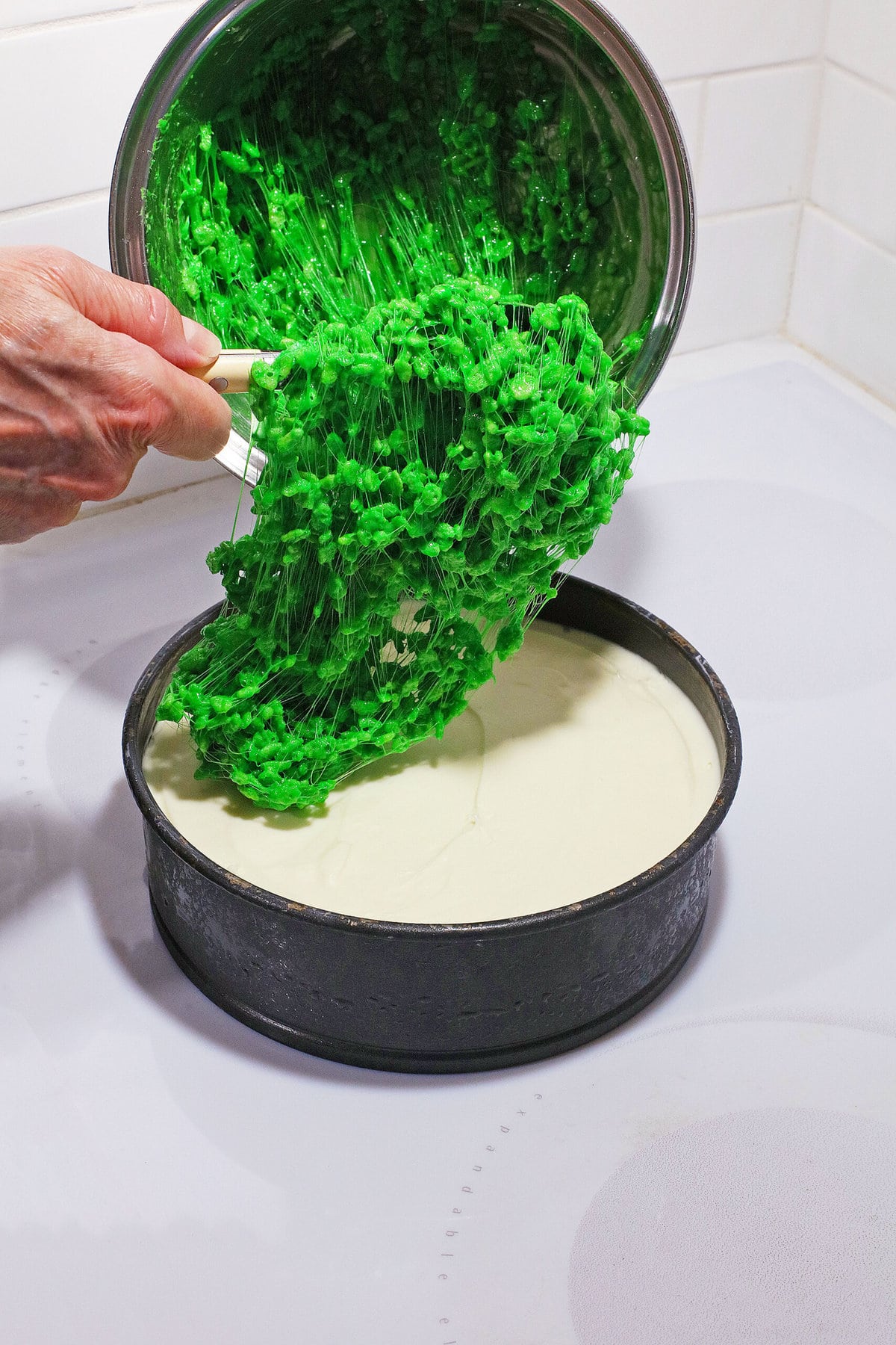 Adding the green crust layer.