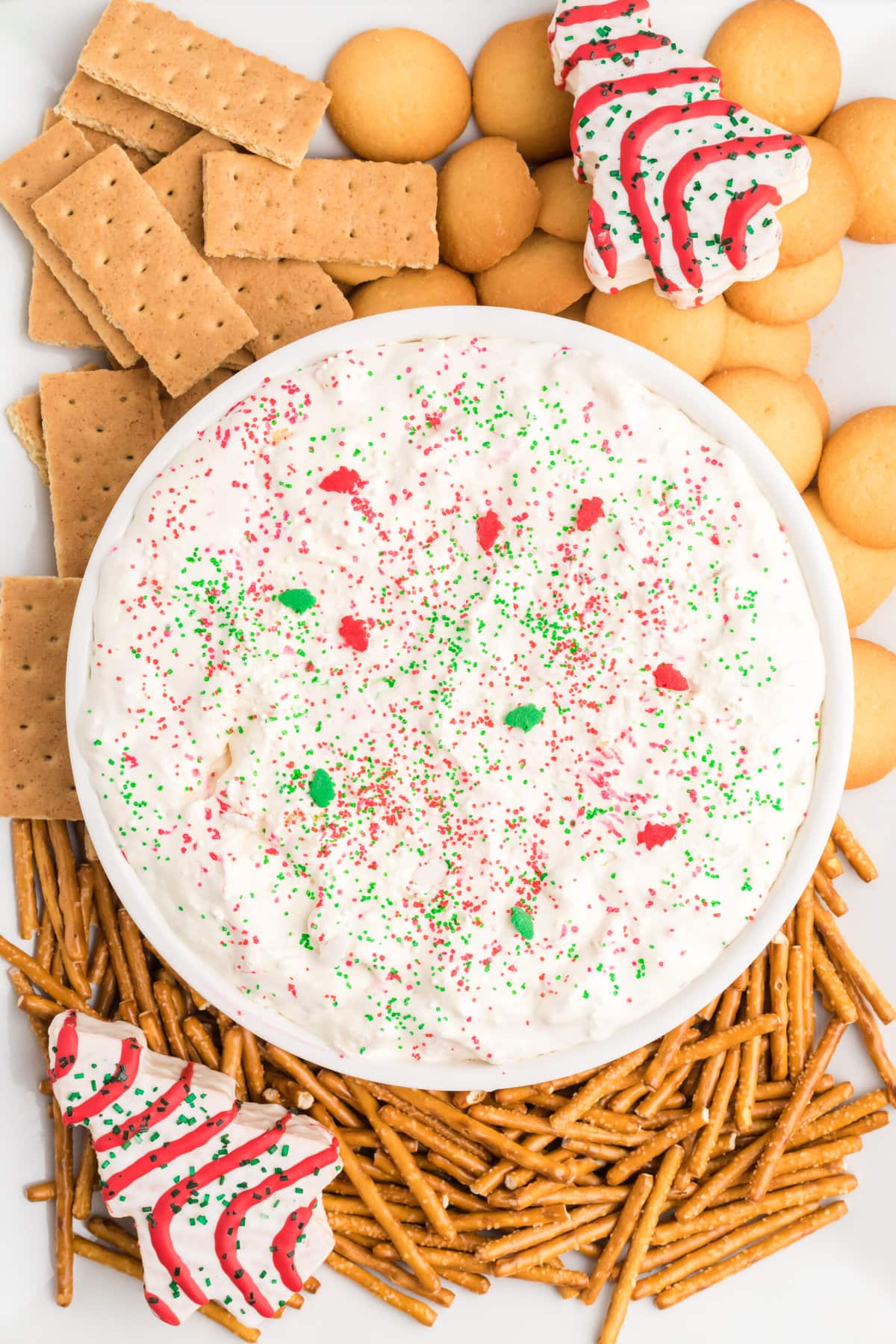 Christmas Tree Cake Dip on a tray with dippers.