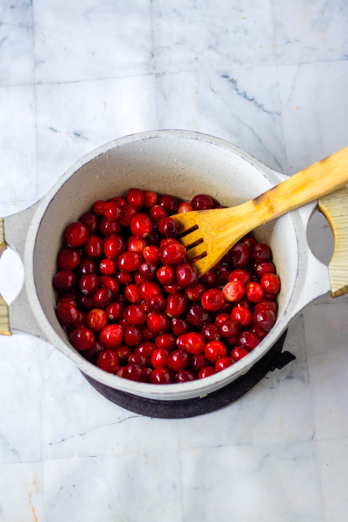 Cooking the cranberries.