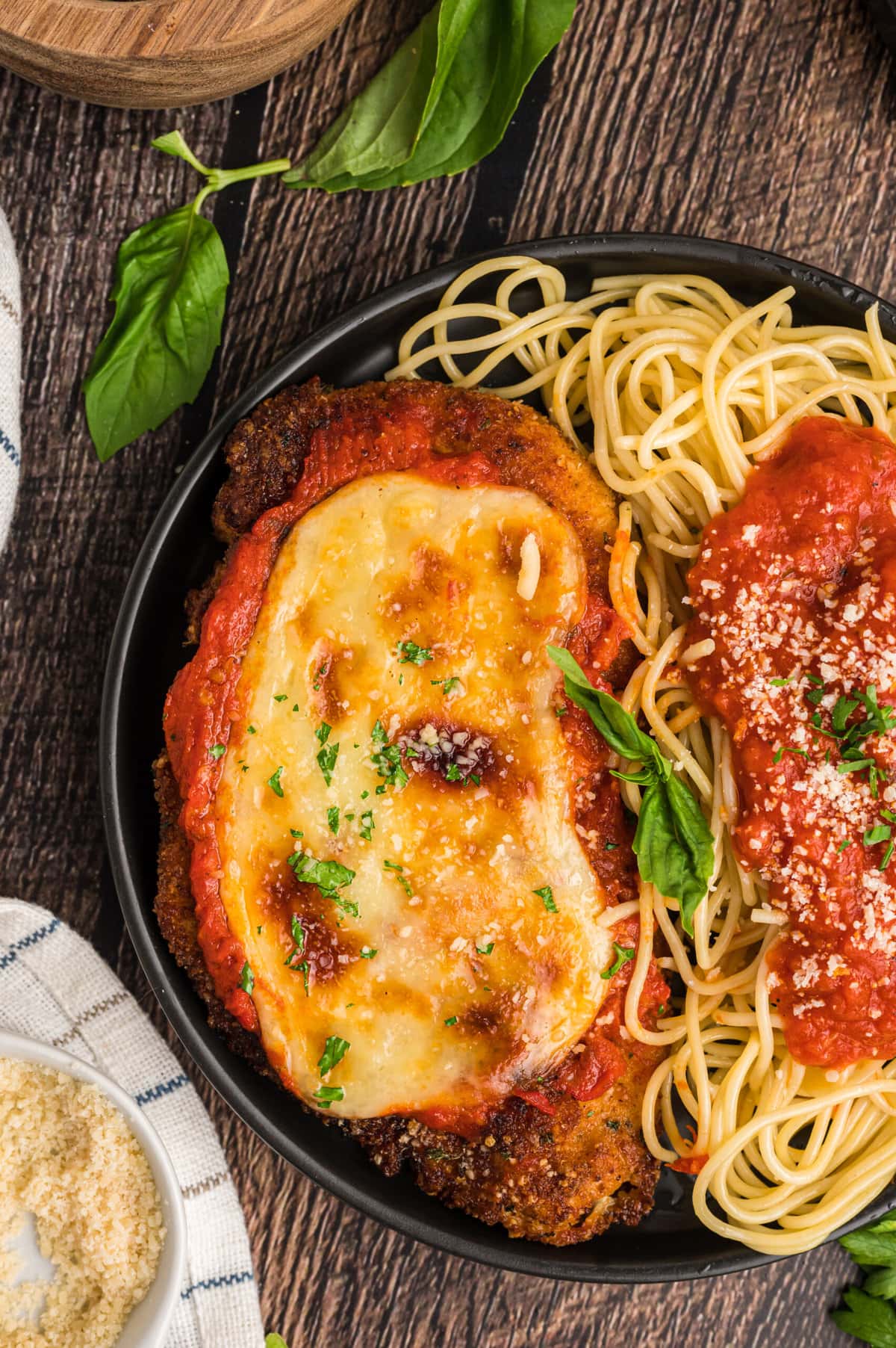 Overhead view of chicken parmesan and spaghetti