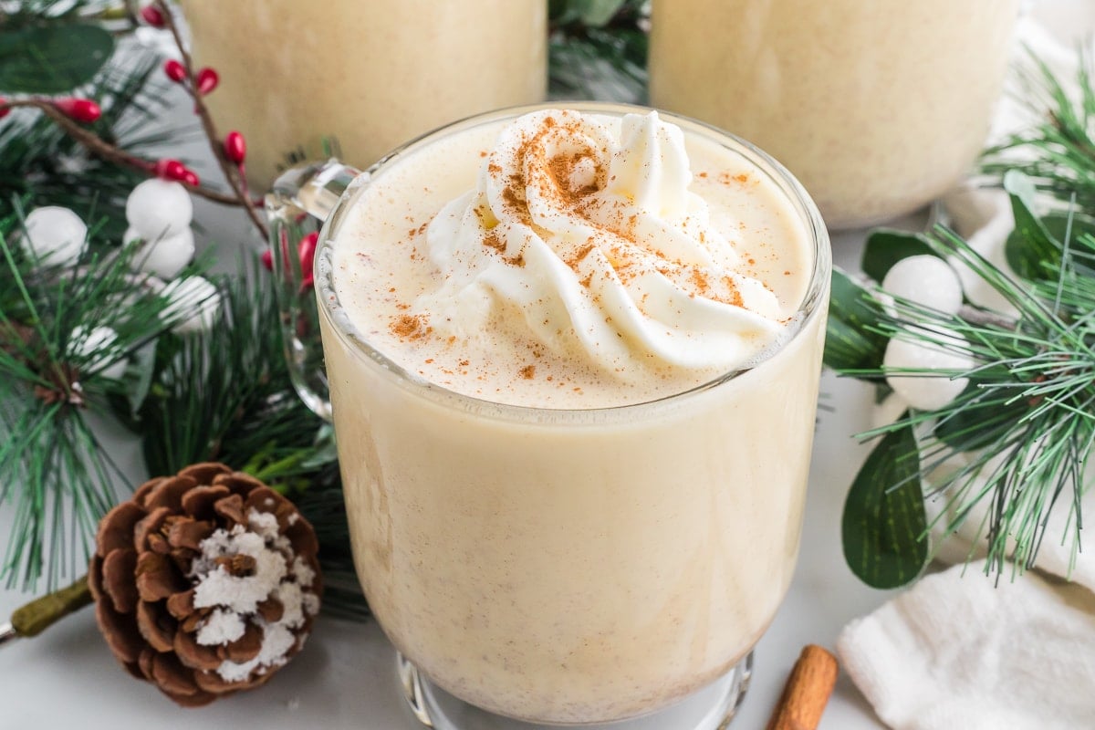 Eggnog on a grey table.