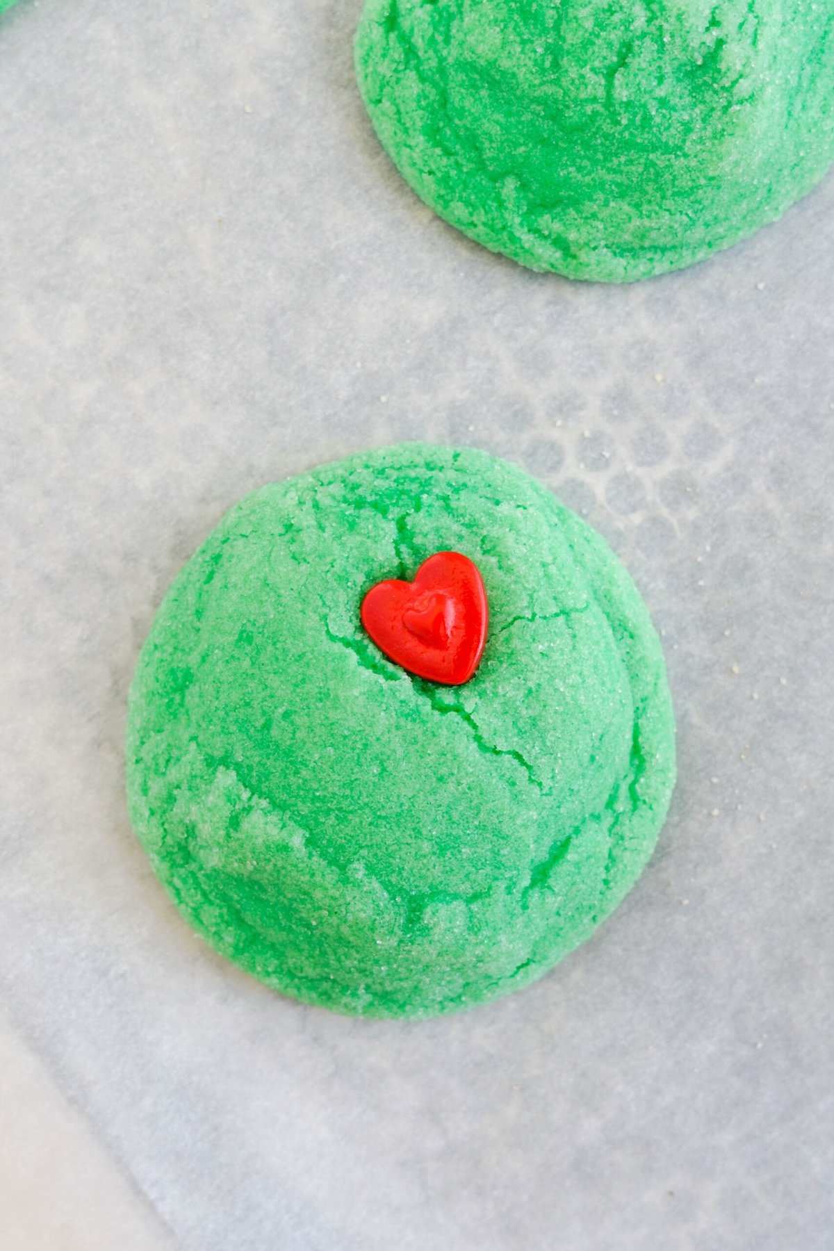 Grinch Cookies with a heart candy in it.