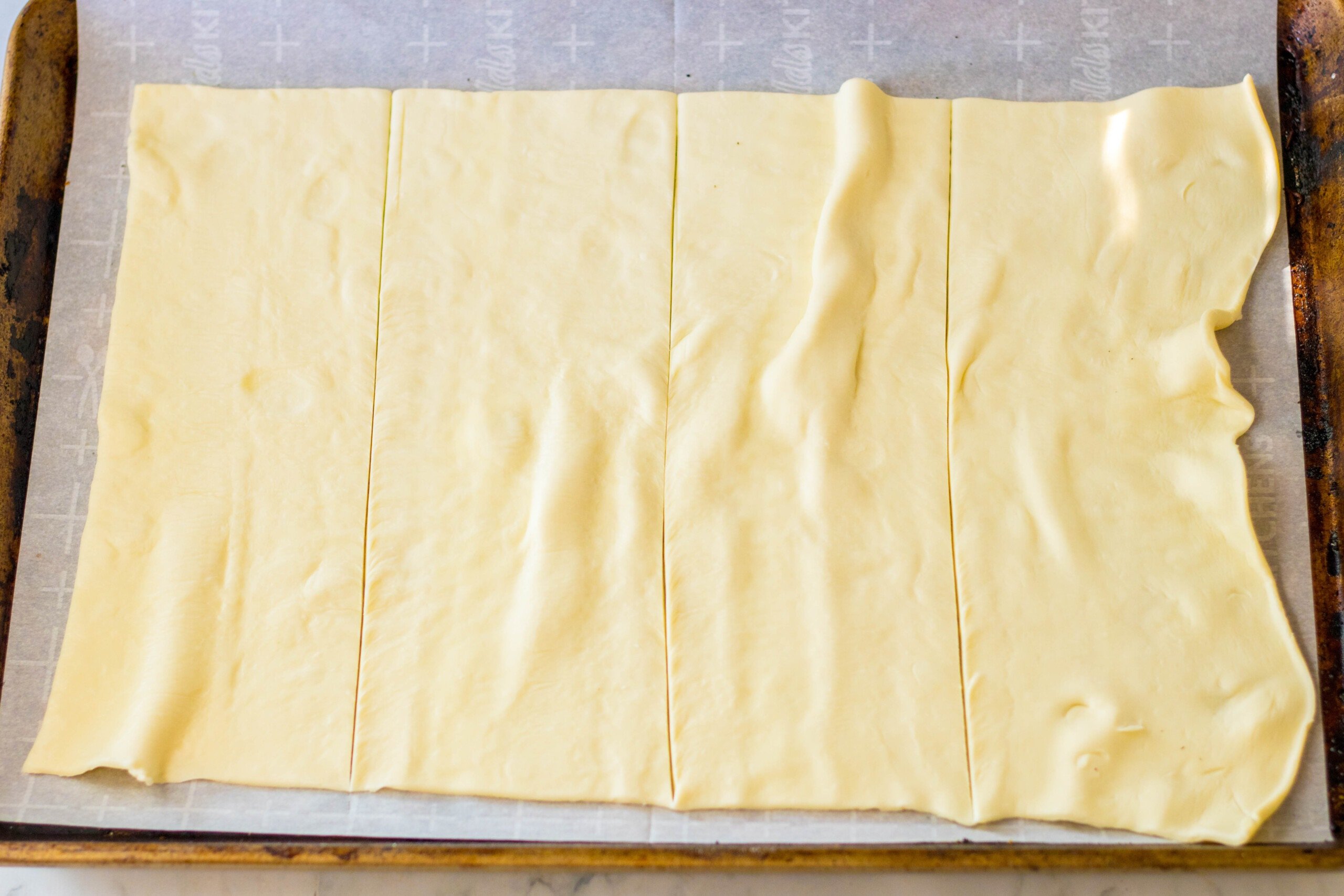 Cutting the puff pastry.