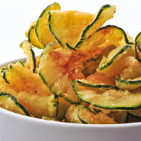 Zucchini Chips - a simple and healthy snack recipe. Just three ingredients and you've got some crunchy zucchini chips, perfect for dipping.