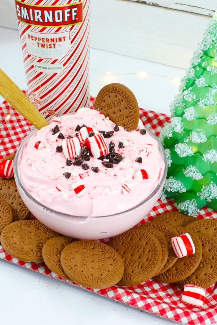 Boozy Peppermint Dip with candies and chocolate chips on top.