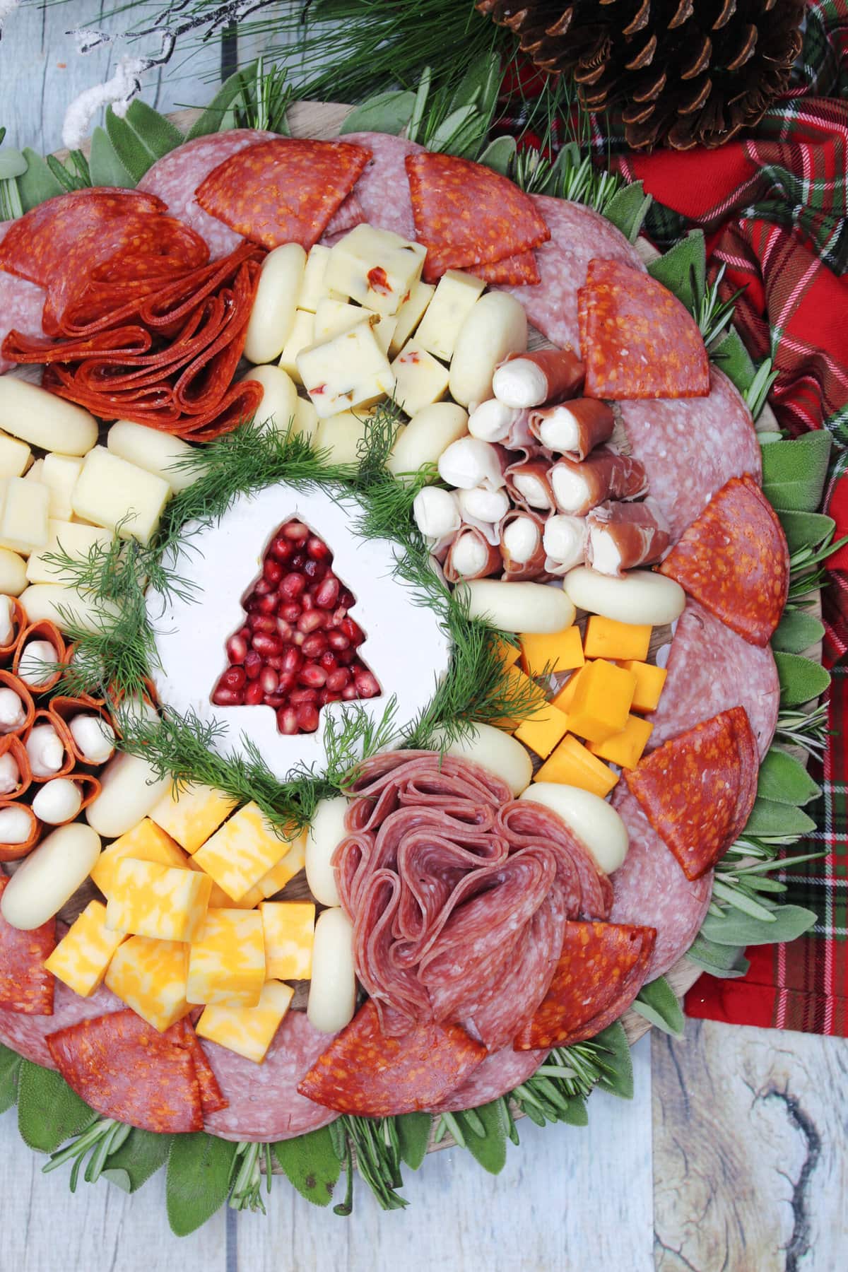 Christmas Charcuterie Board with a tree instead of a gingerbread cut out.