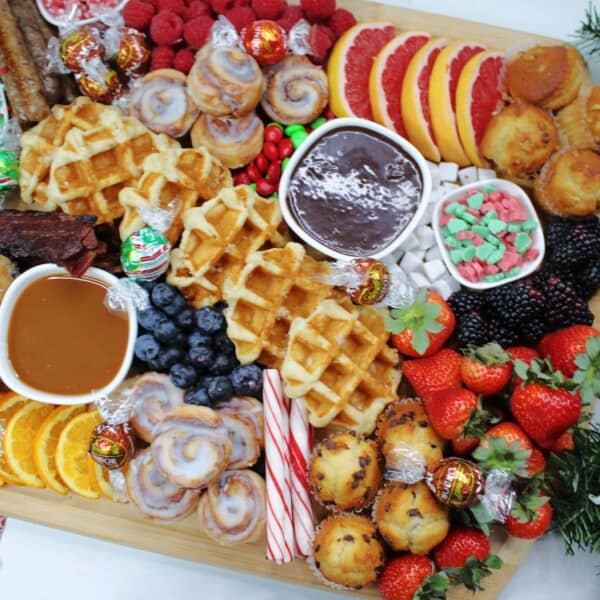 Holiday Breakfast Charcuterie Board is a brown wooden board.