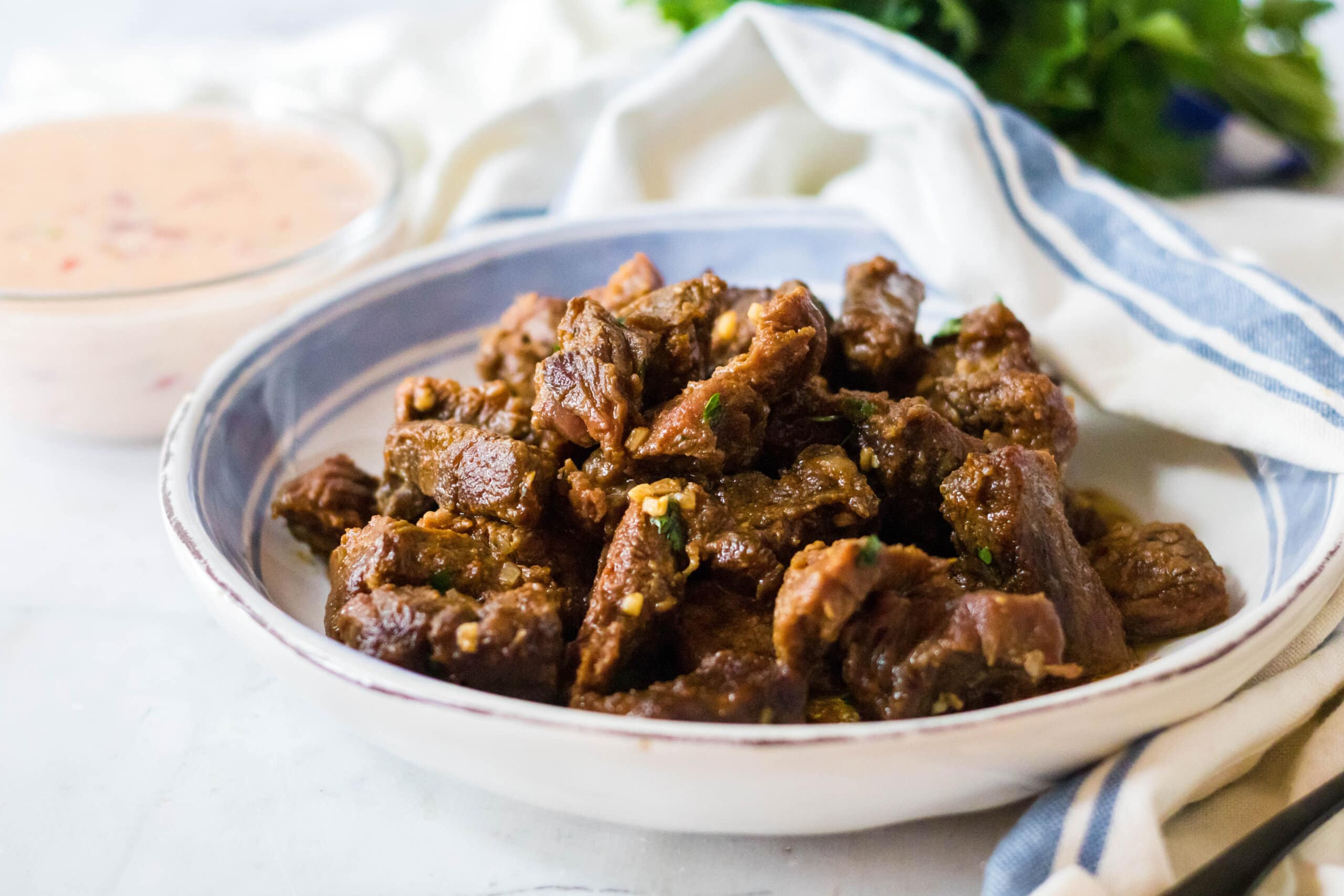 Mexican Steak Bites in a white bowl.