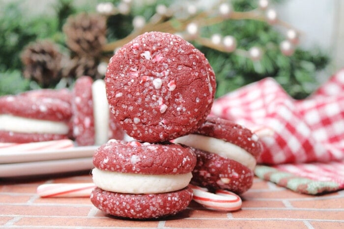 Red Velvet Sandwich Cookies with candy canes.