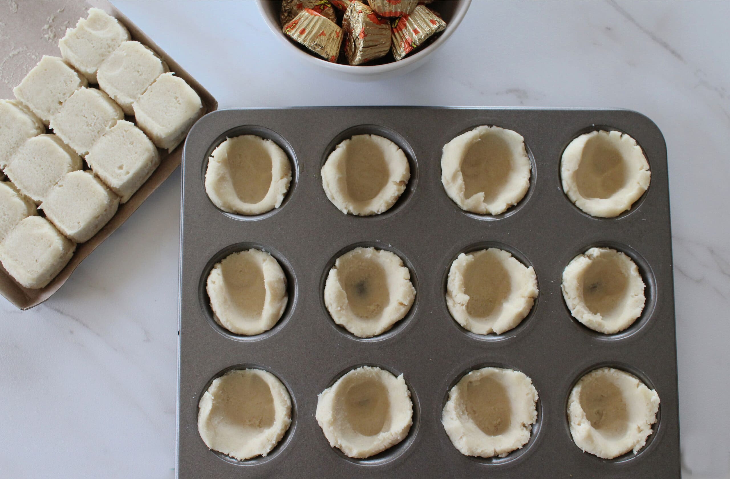 Forming the cookie cups.